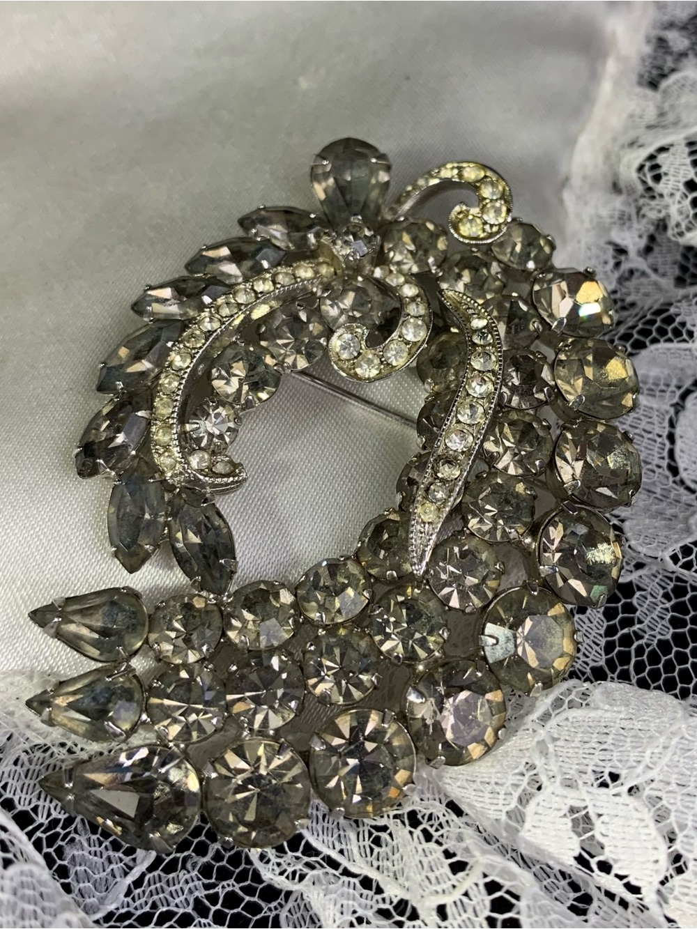 Albert Weiss Smoky Grey and Clear Crystal Floral Swirl Brooch